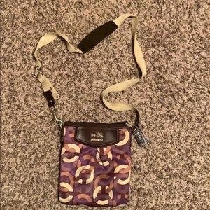 Coach crossbody purse.